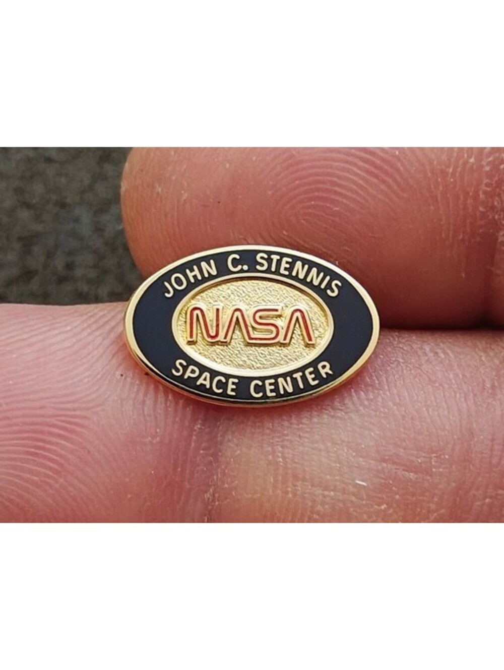 1980/90s NASA John C. Stennis Space Center Gold Tone Red & Black Enamel Pin.